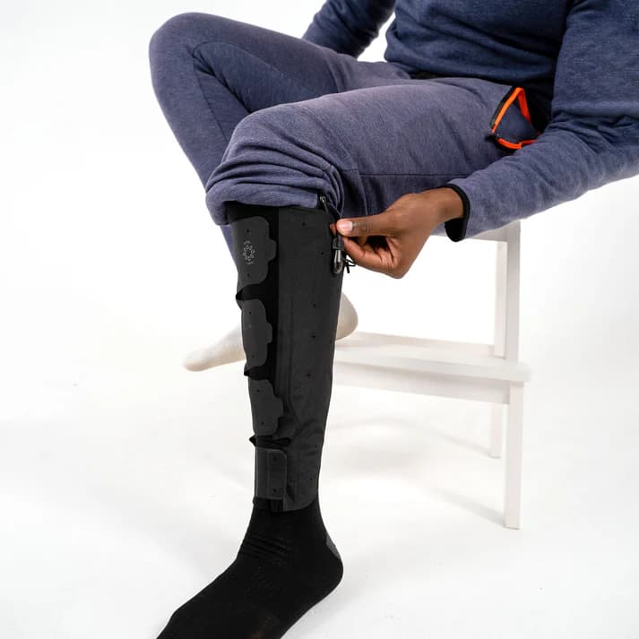 Compression garment worn on lower leg
